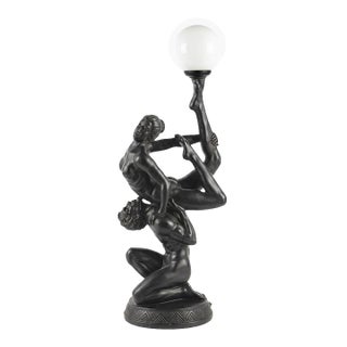 1970s Sculptural Black Figural Table Lamp With Frosted White Globe For Sale