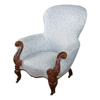 Antique Victorian Carved Walnut Spoon-Back Blue Floral Salon Armchair C. 1880s For Sale