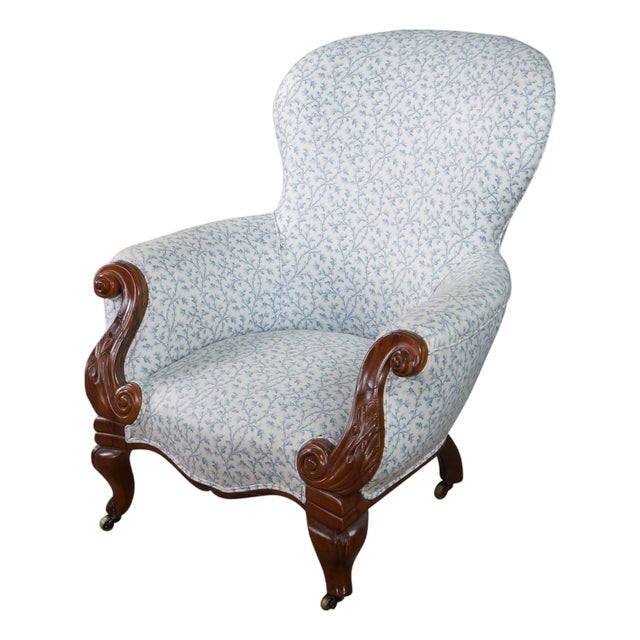Antique Victorian Carved Walnut Spoon-Back Blue Floral Salon Armchair C. 1880s For Sale