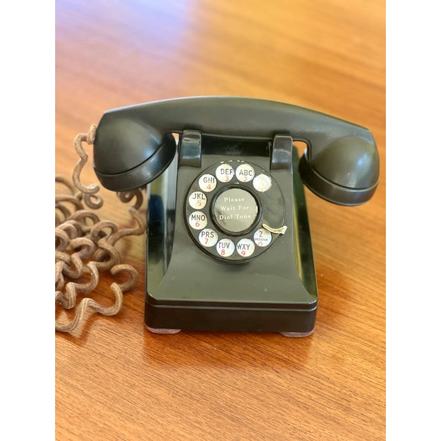Bring definitive mid-century industrial charm to your workspace or shelving setup with this authentic Western Electric...