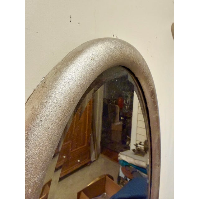 Antique Beveled Silver Leaf Oval Mirror. Good overall condition, mirror is hand beveled and nice and clear. Wire on back...