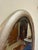 Antique Beveled Silver Leaf Oval Mirror. Good overall condition, mirror is hand beveled and nice and clear. Wire on back...