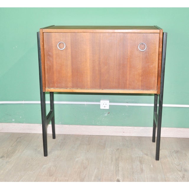 Bar Cabinet with Chrome Handles, 1960s, in Worn conditions. Designed 1960 to 1969