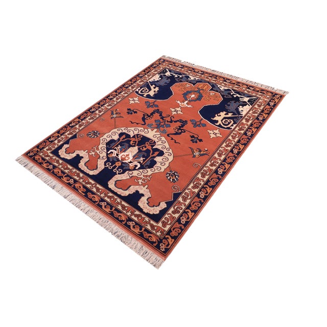 Enhance your home with the timeless craftsmanship of a hand-knotted Kargahi wool rug, celebrated for its tribal artistry,...