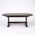A beautifully crafted vintage Ercol elm oval extending dining table, showcasing the timeless craftsmanship and practical...
