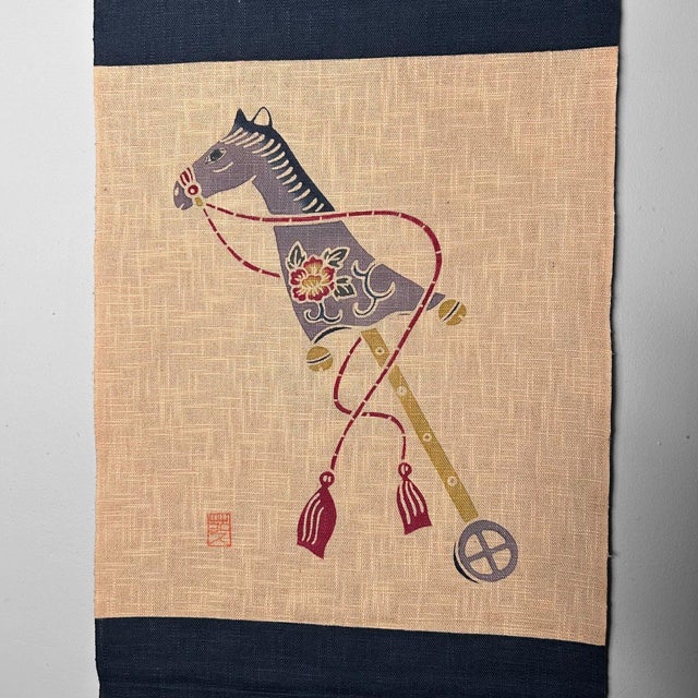 Unique Japanese scroll on natural textile, featuring a charming toy horse in traditional style. Dimensions: height 90 cm,...