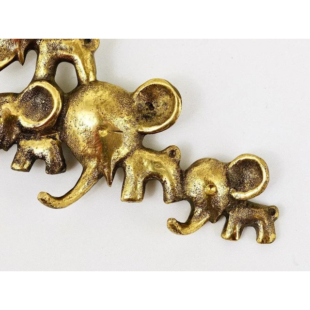 A charming and rare key holder, displaying five elephants in different sizes. A very humorous design by Walter Bosse,...