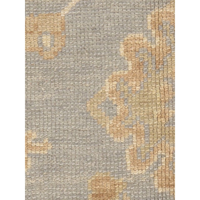 A recreation of a classic Oushak rug using the finest of material and hand woven in India by true craftsmen. The five...