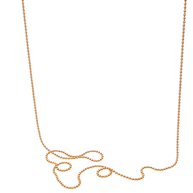 A delicate Tiffany & Co. small bead pendant necklace crafted in 18ct rose gold, featuring a minimalist bead motif...