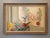 FLORAL & FIGURINE Size: 50 x 71 cm (including frame) Oil on Canvas An elegant and serene mid-century still life interior...