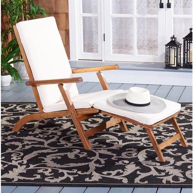 Inspired by ocean liner deck chairs, this inviting outdoor lounge chair exudes elegant relaxation. Crafted of sustainable...