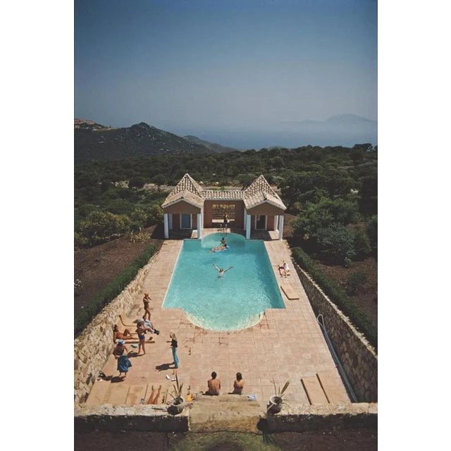 Pool At El Cuarton 1971 by Slim Aarons Slim Aarons Limited Estate Edition Bathers at a pool in El Cuarton, Costa de la...