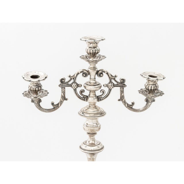 Austrian .800 Silver Candelabrum, 1872-1922, struck with hallmarks, the three lights with two scroll form branches mounted...