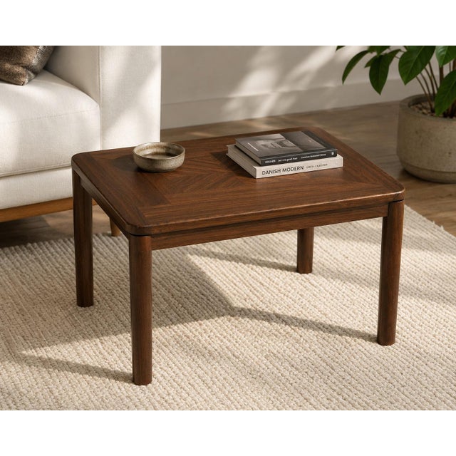 A beautifully crafted vintage Danish Modern side table featuring solid teak construction, clean Scandinavian lines, and an...
