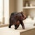 Dimensions: 12" W x 5" D x 10" H Vintage hand carved elephant figurine in solid wood will bring in an old world charm to...