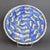 A hand-painted earthenware plate attributed to Shahidi , the noted Persian ceramics workshop founded in Rasht on the...