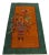 This exquisite rug&nbsp;features a striking orange-yellow hue with vibrant green borders, adding a touch of elegance to...