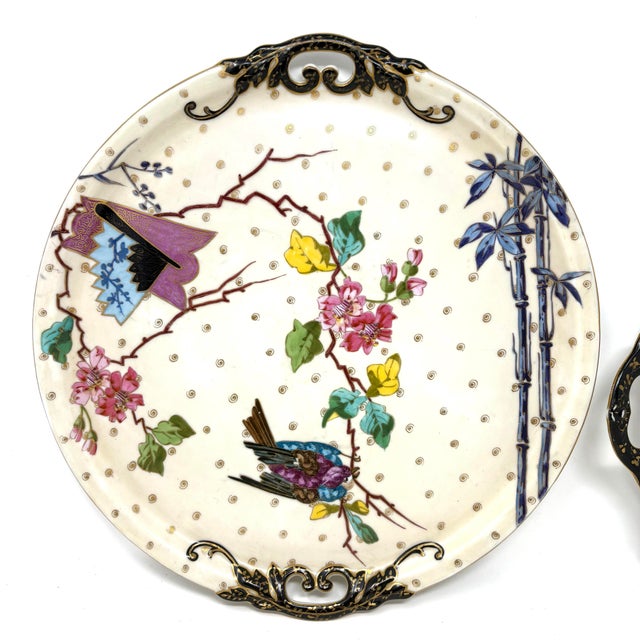 This exquisite pair of Japanese export porcelain plates hails from the Meiji period (circa 1890–1910), embodying the...