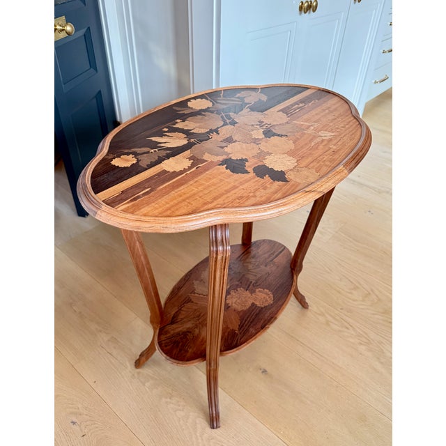 Émile Gallé was a prominent French artist known for his exquisite Art Nouveau furniture, particularly his intricately...