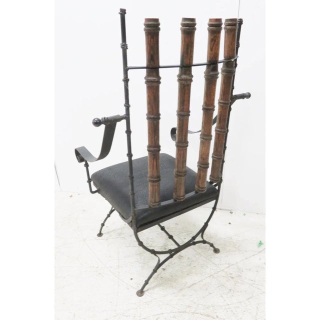 Faux Bamboo Desk Chair. Made of iron with oak spindle backs. black leather seat. seat height 17".
