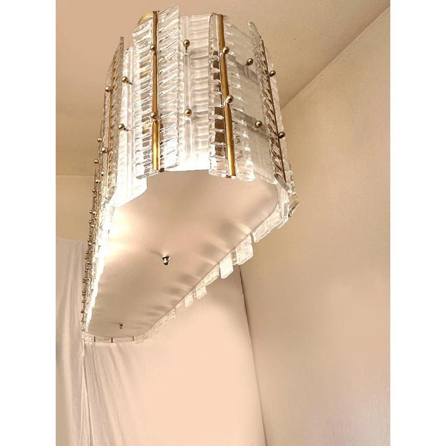 Contemporary gold chandelier in Murano Glass full of leafes that give a touch of "tropical" design. Extremally elegant and...