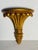 Beautiful gold pain ceramic wall bracket in a shape of achantus.