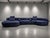 A sculptural and highly sought-after “Piaf” sectional sofa by Baxter, crafted in Italy and upholstered in sumptuous blue...