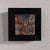 This intimate oil painting captures a serene moment of a bunny nestled among soft, muted colors. The brushwork is...
