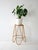 Swedish bamboo pedestal with round top, lightweight and versatile for plants or decorative objects. The woven bamboo...