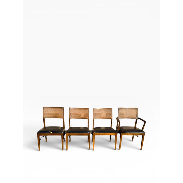 A beautifully crafted set of four vintage mid‑century dining chairs by Lane, featuring warm walnut frames, sculptural...