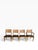 A beautifully crafted set of four vintage mid‑century dining chairs by Lane, featuring warm walnut frames, sculptural...