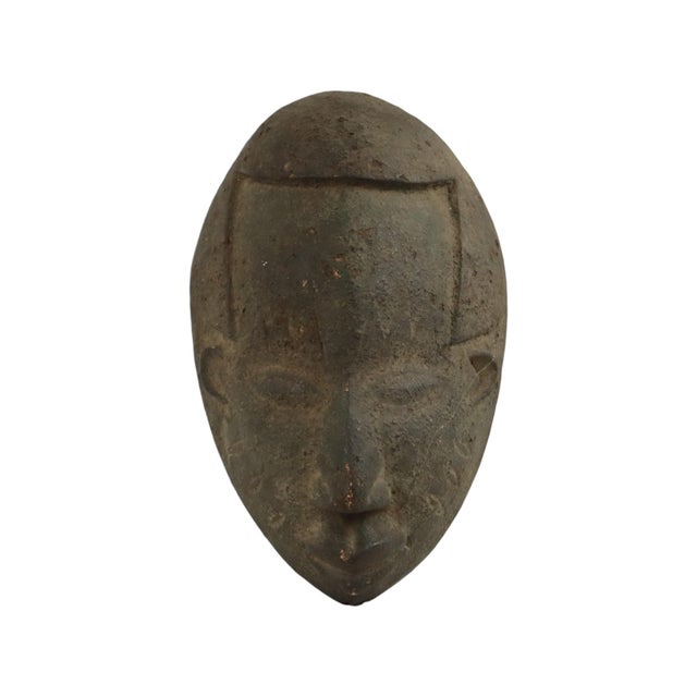 Beautiful African ceremonial mask with a lovely textured patina; a highly decorative piece of African tribal art, likely...