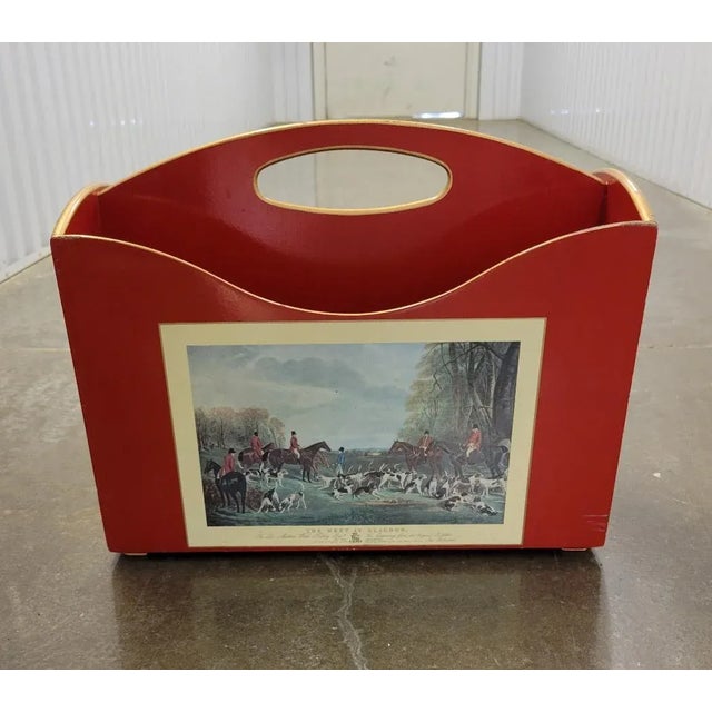 Vintage wood and red lacquer with gold trim magazine rack made in England for Brooks Brothers. Having a traditional...