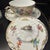 An exquisite late 19th to early 20th-century German fine porcelain bouillon/cream soup set decorated by the master...