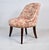 A pair of French style slipper chairs in Country French Toile upholstery with brass tack detailing and attractive splay...