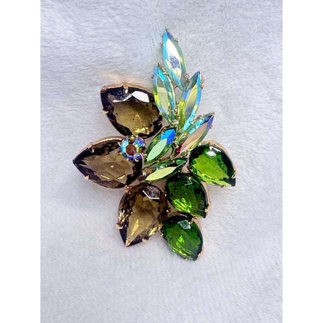 A striking mid‑century Czech rhinestone brooch signed CZECHO/SLOVAKIA, dating to the 1956–1968 export period. This layered...