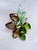 A striking mid‑century Czech rhinestone brooch signed CZECHO/SLOVAKIA, dating to the 1956–1968 export period. This layered...
