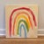 Acrylic on canvas, 24 x 24 x .75. Edges painted the same creamy white as the background, back wired, ready to hang.
