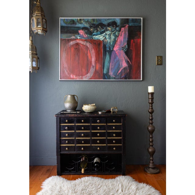 A large signed oil painting by George Michaud of four matador bullfighters titled 'Moment Before'. We love the dynamic...