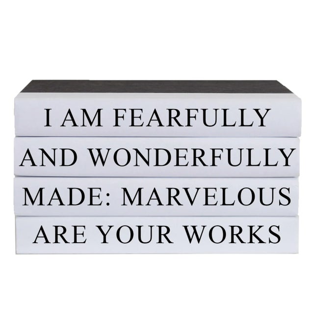 Let your thoughts be seen with these four decorative hardback books in black with white spines.