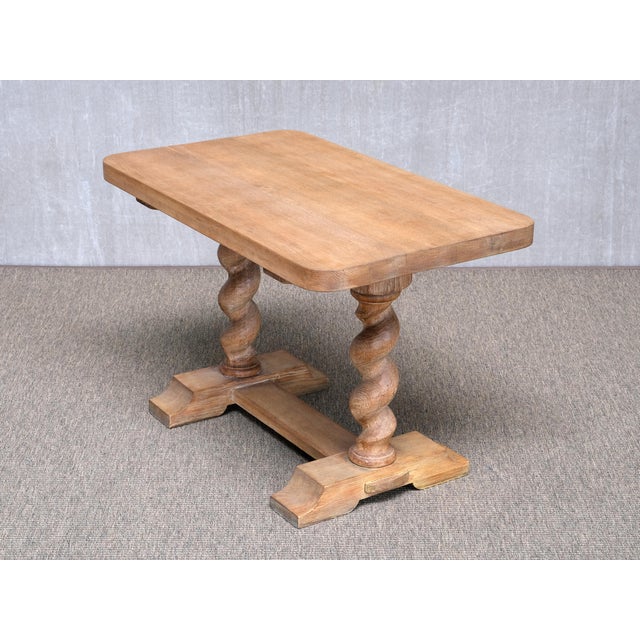 This unique side table was made in Sweden, circa 1920, by an unknown maker. The striking design draws on Baroque furniture...