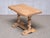 This unique side table was made in Sweden, circa 1920, by an unknown maker. The striking design draws on Baroque furniture...