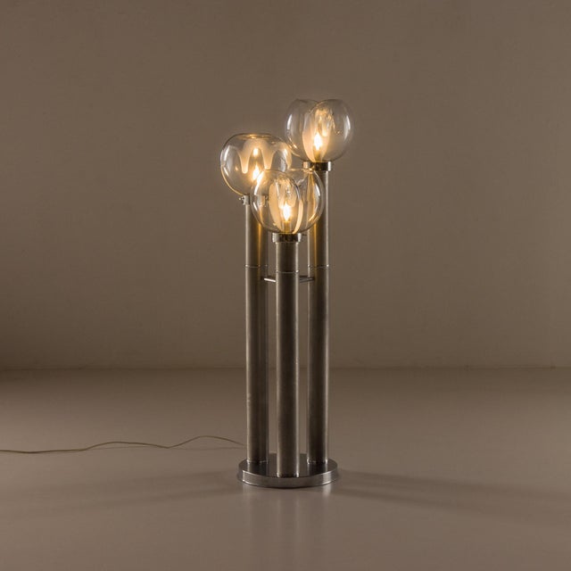 This floor lamp comes from the 1960s, was manufactured by Mazzega in Italy, and most likely designed by Toni Zuccheri. It...