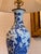 Pair of blue and white porcelain baluster vases mounted as table lamps, painted with flowering branches, peonies, and...