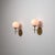 A refined pair of italian wall sconces from the 1950s, defined by a balanced and understated design. Each sconce features...