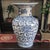 This vintage Chinese porcelain blue and white vase bears the "Jiaging Nian Zhi" mark in the Qing style. Originating from...