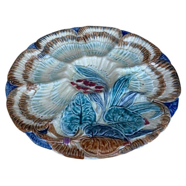 19th-Century Majolica oyster plate Wasmuel (Belgium) decorated with flowers.