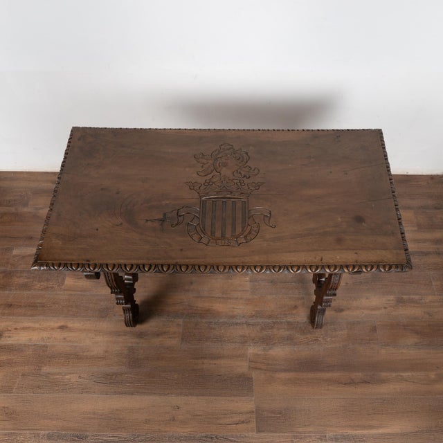 Spanish 19th Century Walnut Writing Table With Carved Family Crest, Spain For Sale - Image 3 of 12