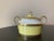 A vintage Italian Richard Ginori 'Contessa' yellow and gold porcelain sugar bowl with lid, circa mid to late-20th century,...