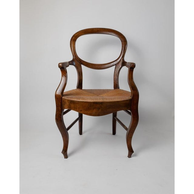 This antique set of two Louis Philippe armchairs from the 19th century is a beautiful example of traditional Italian...